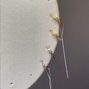 0.15 CTW Moissanite Diamond Sterling Silver Mini Huggies